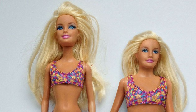 An artist has made mockup images comparing Barbie's body to an average 19-year-old woman's body, Pittsburgh, America - 02 Jul 2013